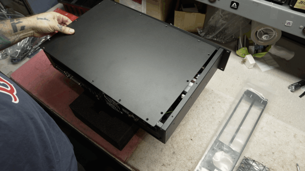 Top Panel being removed from the chassis.